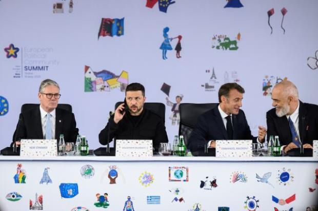 From left, Britain<em></em>'s Prime Minister Keir Starmer, Ukraine<em></em>'s President Volodymyr Zelenskyy, France<em></em>'s President Emmanuel Macron and Albania<em></em>'s Prime Minister Edi Rama attend a plenary meeting at the beginning of a summit wher<em></em>e the leaders of 47 European countries and organizations will discuss security, defense and democratic standards, in Tirana, Albania, Friday, May 16. 2025. (Leon Neal/Pool via AP)